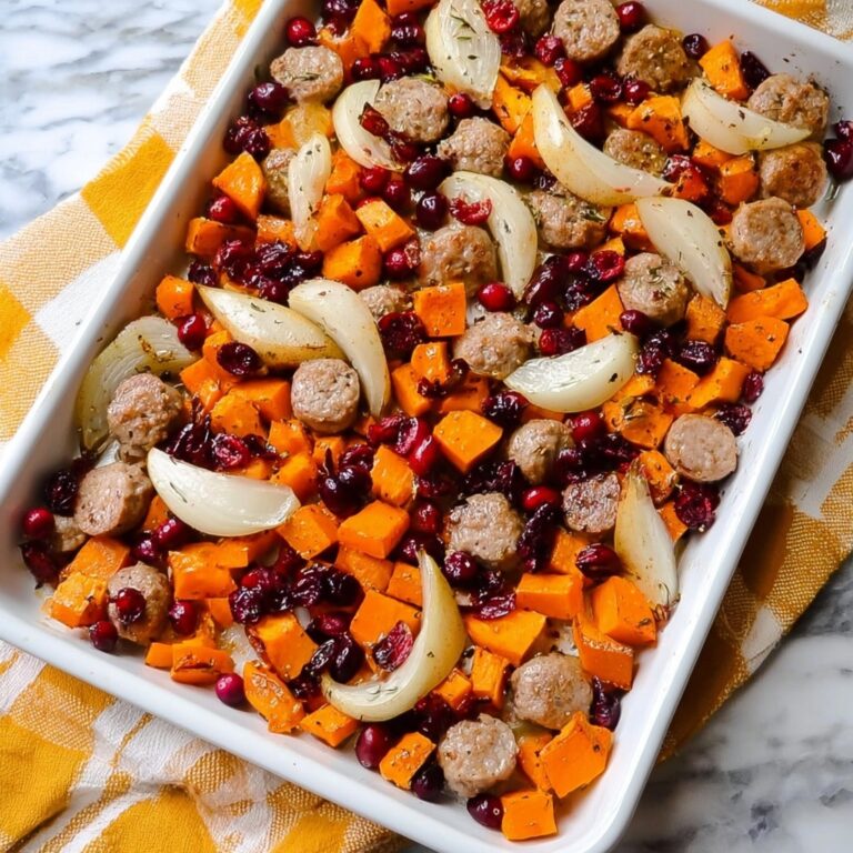 Sheet Pan Cranberry Chicken Sausage with Sweet Potatoes, Apples, and Onions Recipe