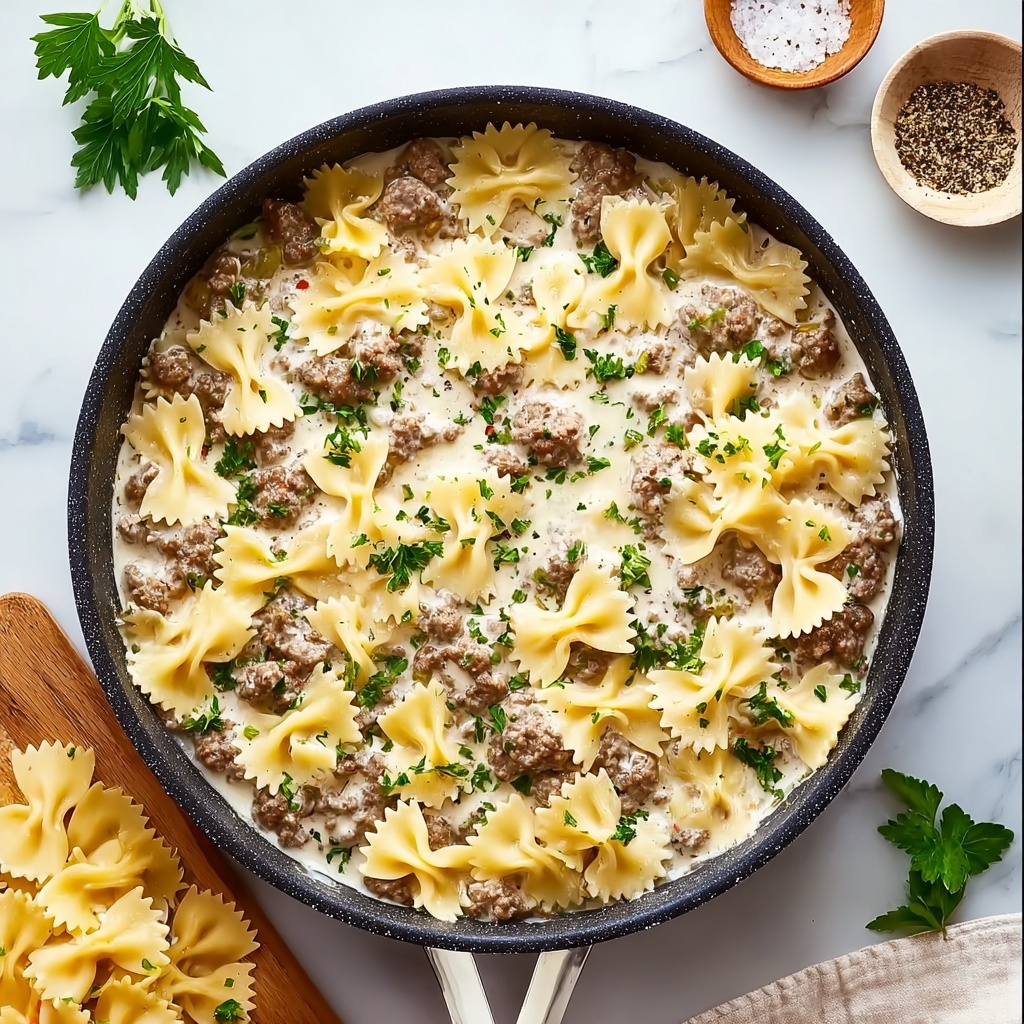 Beef and Bowtie Pasta with Alfredo Sauce Recipe - Recipe Image