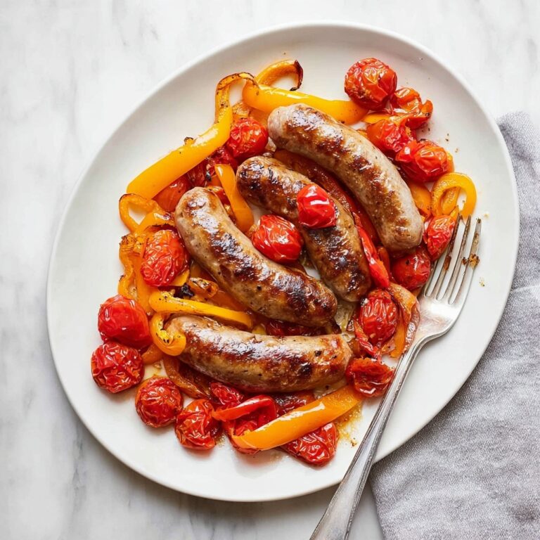 Oven-Roasted Italian Sausage with Cherry Tomatoes and Bell Peppers Recipe